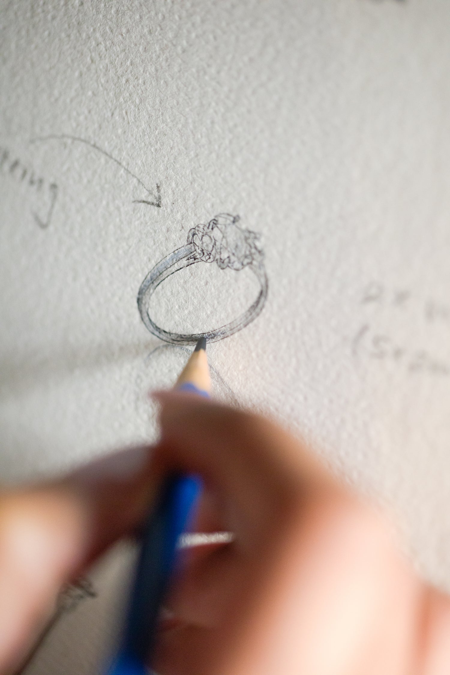 Hand-drawn sketch of a custom jewellery ring, highlighting unique design elements for a personalized touch."