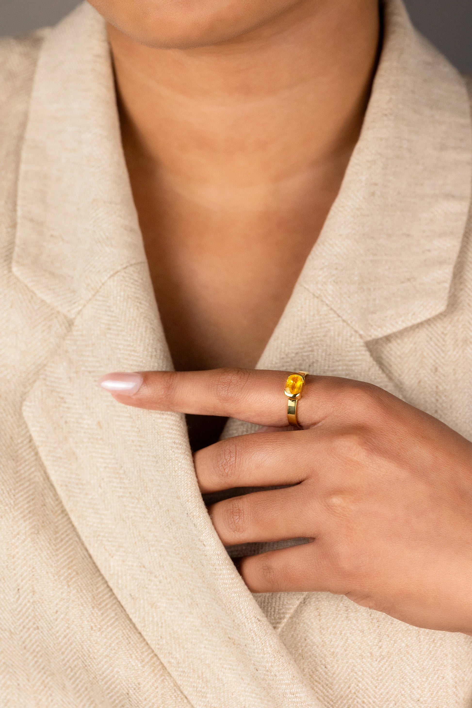 14K yellow gold yellow sapphire ring featuring a 1.24ct unheated Sri Lankan yellow sapphire in a minimalist bezel setting, perfect for everyday elegance.