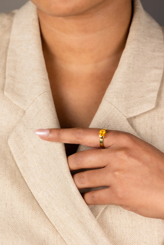 14K yellow gold yellow sapphire ring featuring a 1.24ct unheated Sri Lankan yellow sapphire in a minimalist bezel setting, perfect for everyday elegance.