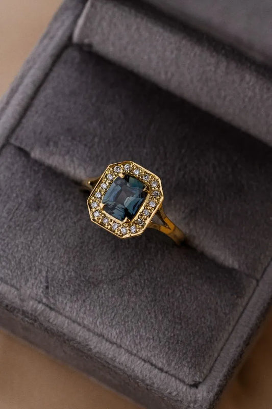 Teal green Ceylon sapphire ring in 18K yellow gold, custom-designed as a heartfelt gift from father to daughter.