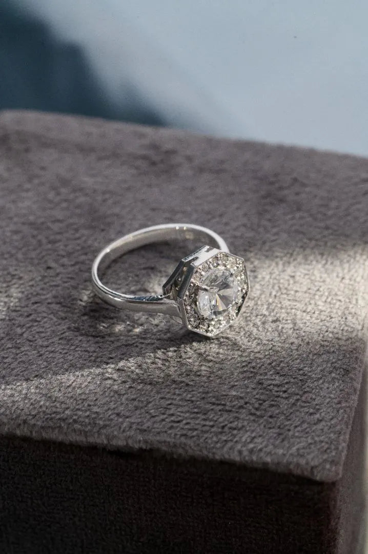 Close-up of bespoke engagement ring design process, featuring Ceylon sapphire-inspired elements and custom pavé diamond details.