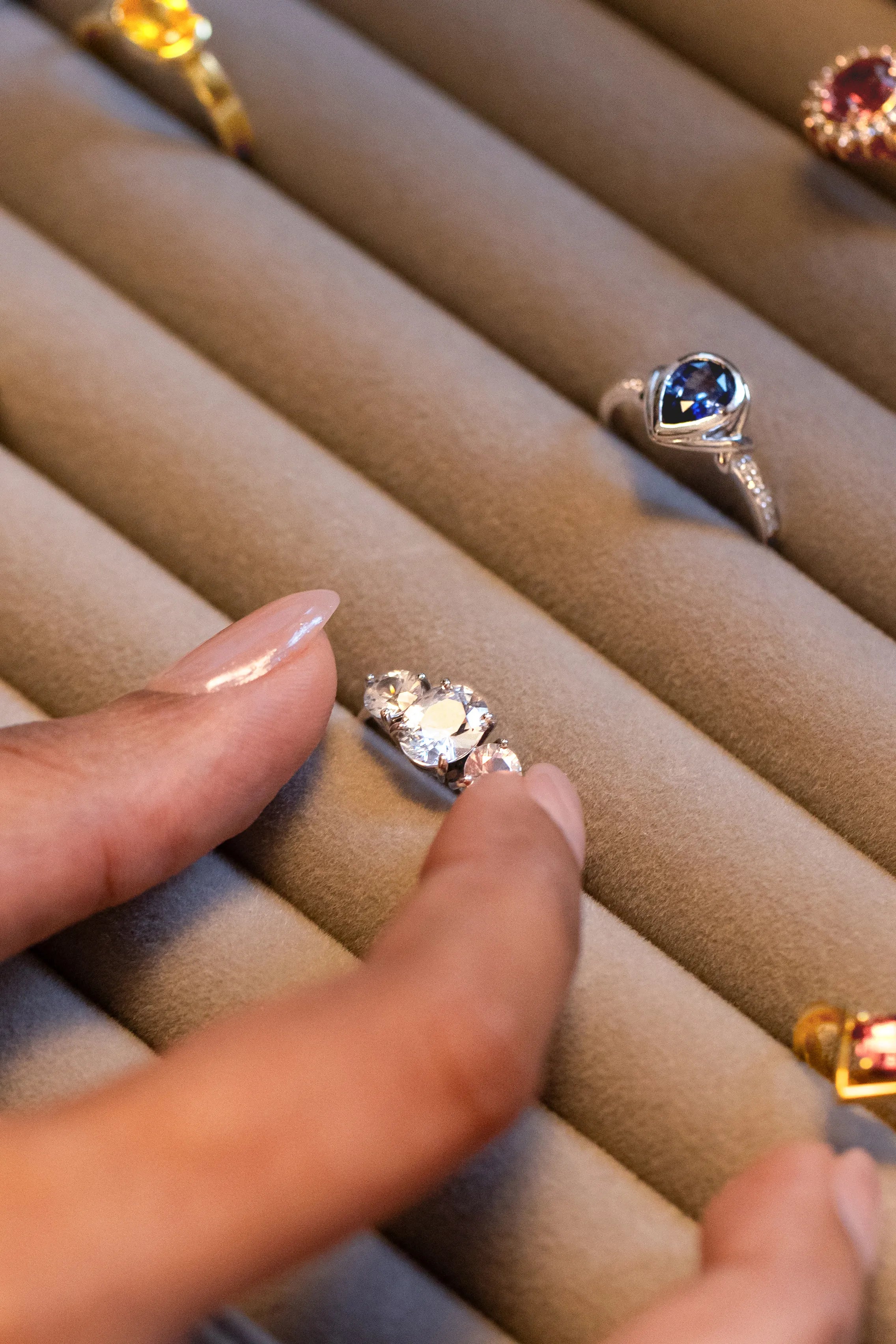 Elegant display of custom rings in a luxurious ring box, showcasing fine craftsmanship and attention to detail for an unforgettable jewelry experience.